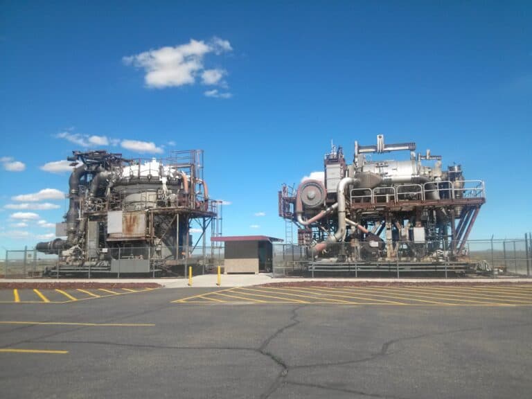 Two prototypes for nuclear powered aircraft, HTRE-2 "Heater 2" on the left and HTRE-3 "Heater 3" on the right, outside of the Experimental Breeder Reactor 1 (EBR-1) site.