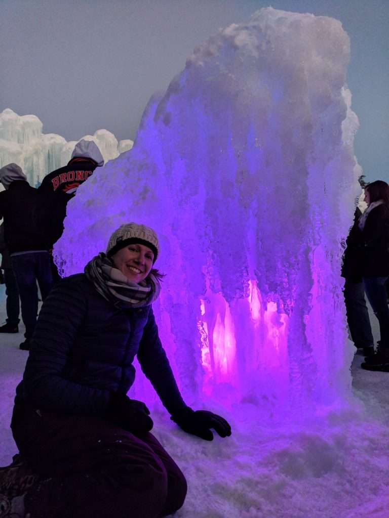 Christine sitting in front of purple ice