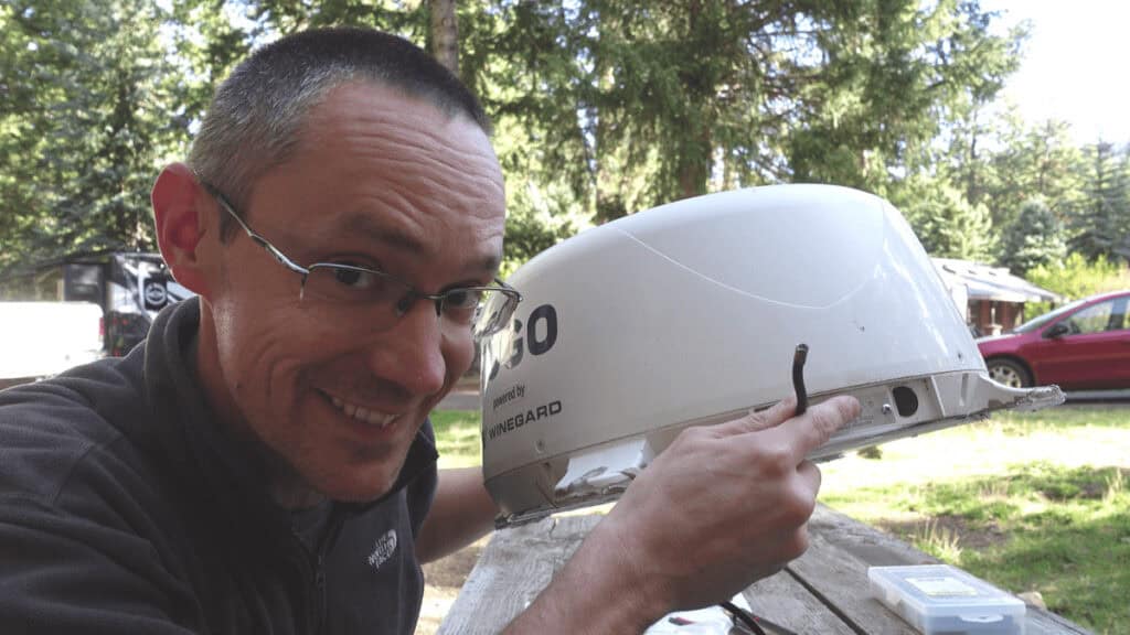 Kevin holding router for RV internet connectivity