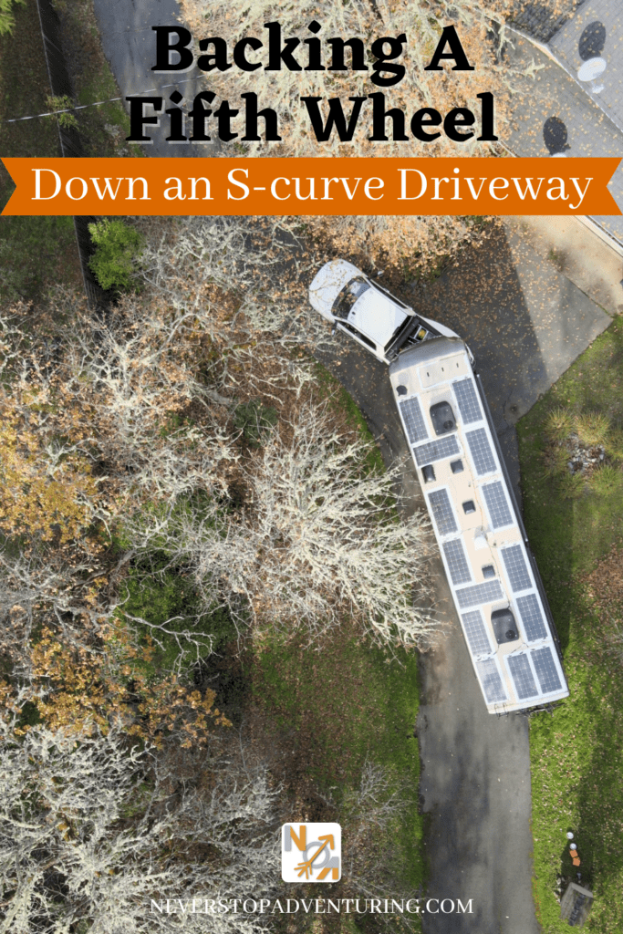 Pinnable image of fifth wheel backing down a curvy driveway