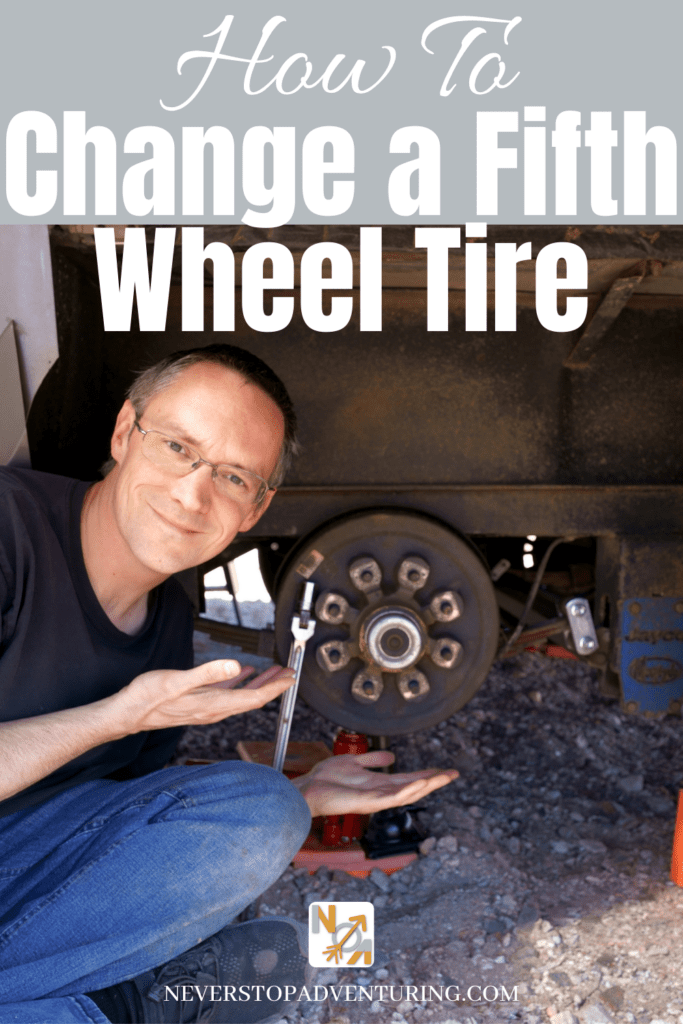 Pinnable image of man changing a flat fifth wheel tire