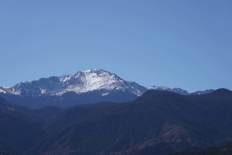 Pikes Peak, America's Mountain, covered in snow and shining in the sun