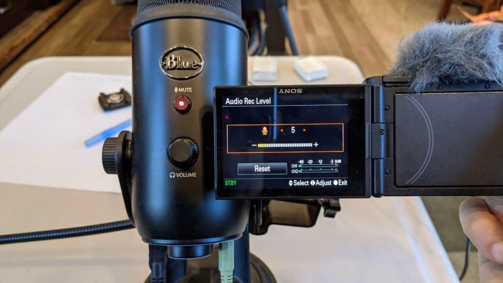 Microphone and Camera screen, family travel resources for filming memories